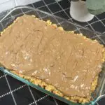 Scotcheroos with gooey chocolate topping and crunchy base.