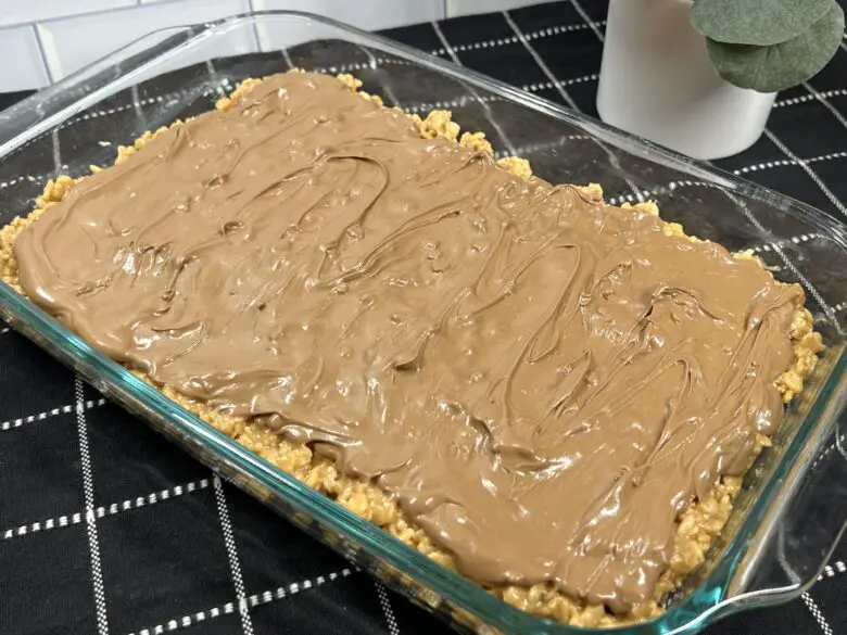Scotcheroos with gooey chocolate topping and crunchy base.
