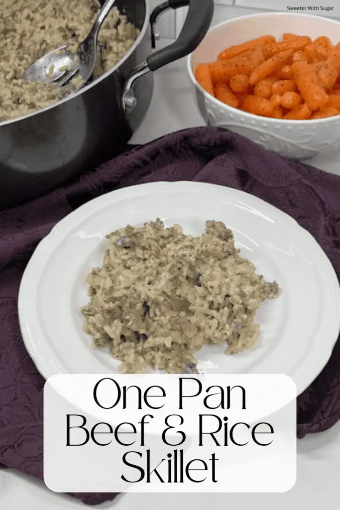 A steaming skillet filled with seasoned ground beef, tender rice, and mushrooms, bell pepper, onion, garlic and seasonings. #OnePanMeals #BeefAndRice #SkilletDinners #EasyDinnerRecipes #ComfortFood #WeeknightDinner #FamilyMeals #BudgetFriendlyRecipes #QuickMeals