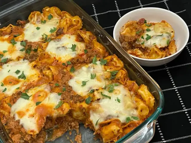Three Cheese Tortellini Casserole is an easy dinner recipe with beef, cheese tortellini pasta and more yummy ingredients. This easy casserole is a delicious comfort food recipe. #Tortellini #ThreeCheese #Casseroles #EasyDinners #Beef #Italianfood