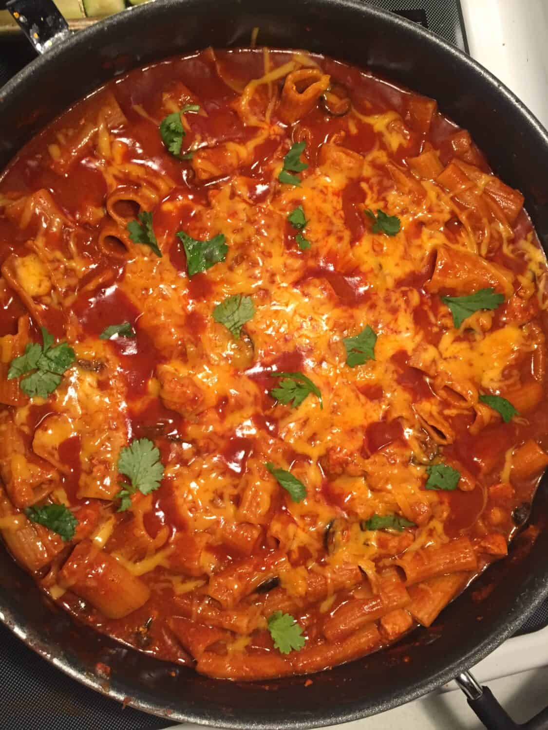 One Pan Spicy Enchilada Pasta | Sweeter With Sugar | An easy one pan chicken dinner with a Mexican flavor. Mexican Recipes, One Pan Dinners, Pantry Recipes, Easy Recipes, Simple Dinner Ideas, #Chicken #EnchiladaSauce #Cheesy #OnePanDinners #SimpleRecipes