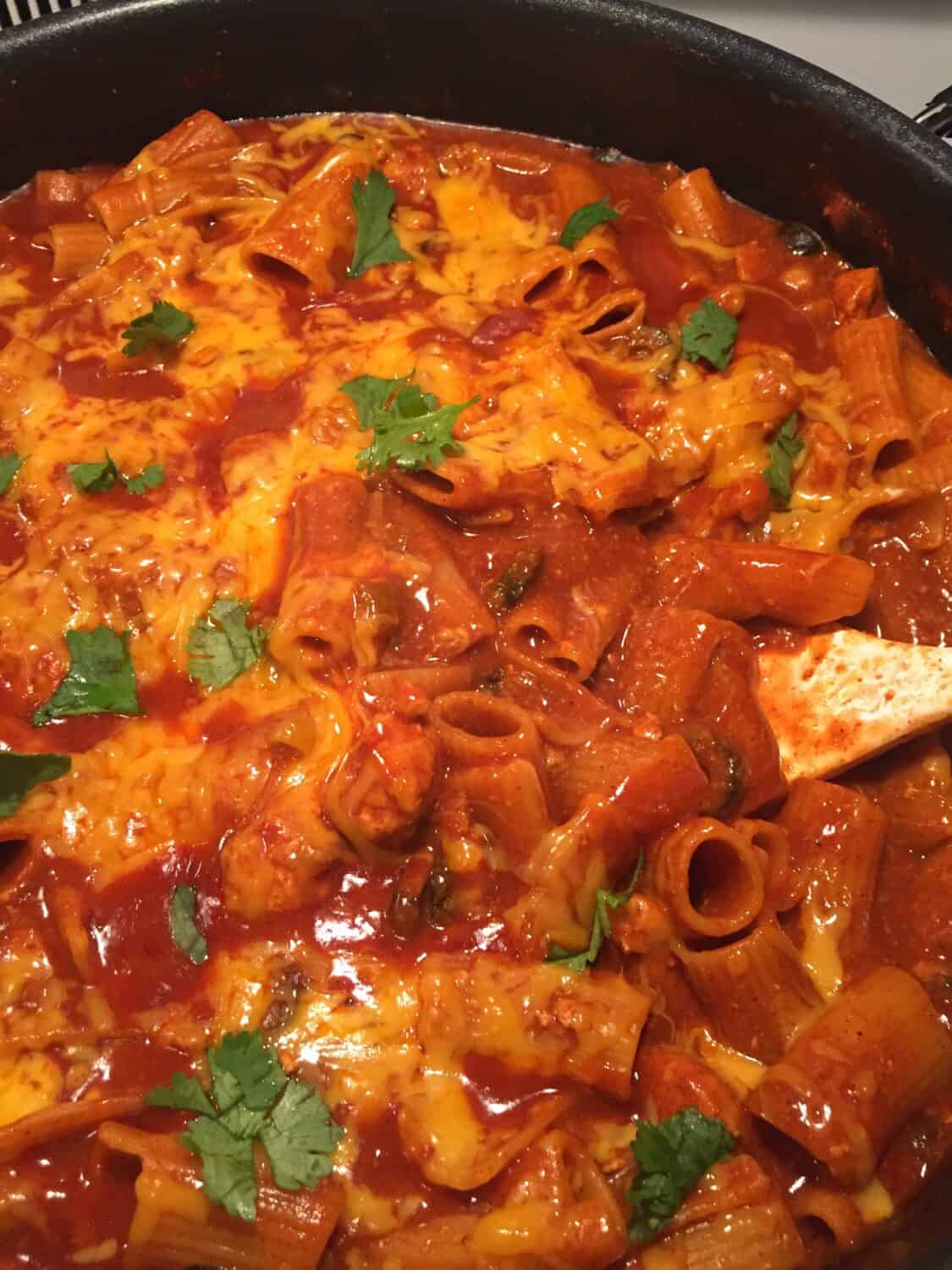 One Pan Spicy Enchilada Pasta | Sweeter With Sugar | An easy one pan chicken dinner with a Mexican flavor. Mexican Recipes, One Pan Dinners, Pantry Recipes, Easy Recipes, Simple Dinner Ideas, #Chicken #EnchiladaSauce #Cheesy #OnePanDinners #SimpleRecipes