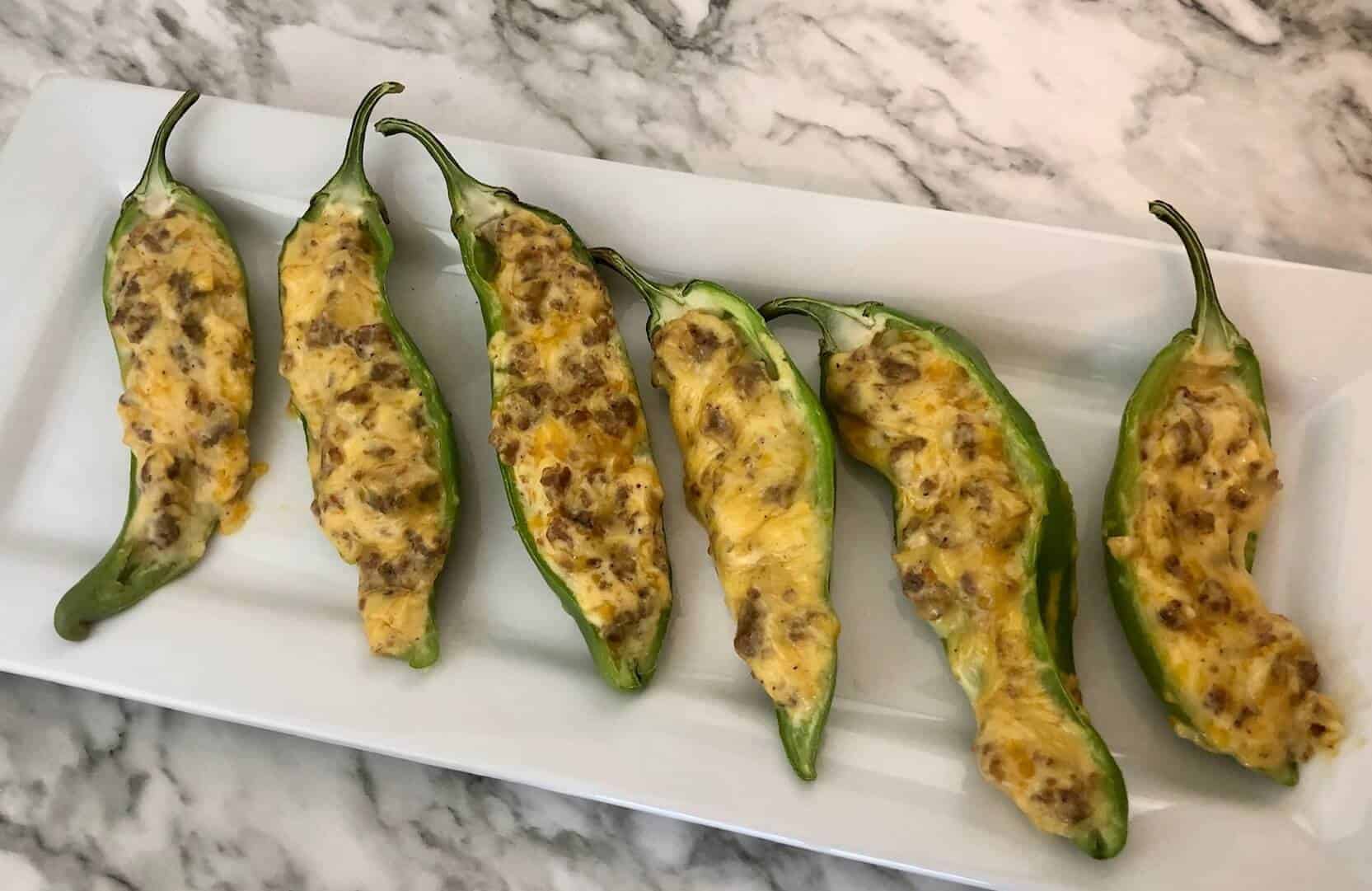 Sausage Stuffed Peppers-Sweeter With Sugar-Sausage Stuffed Peppers are easy to make and very flavorful. They are the perfect appetizer or side for parties or a Mexican Dish.#StuffedPeppers #EasySides #EasyRecipes #Appetizers