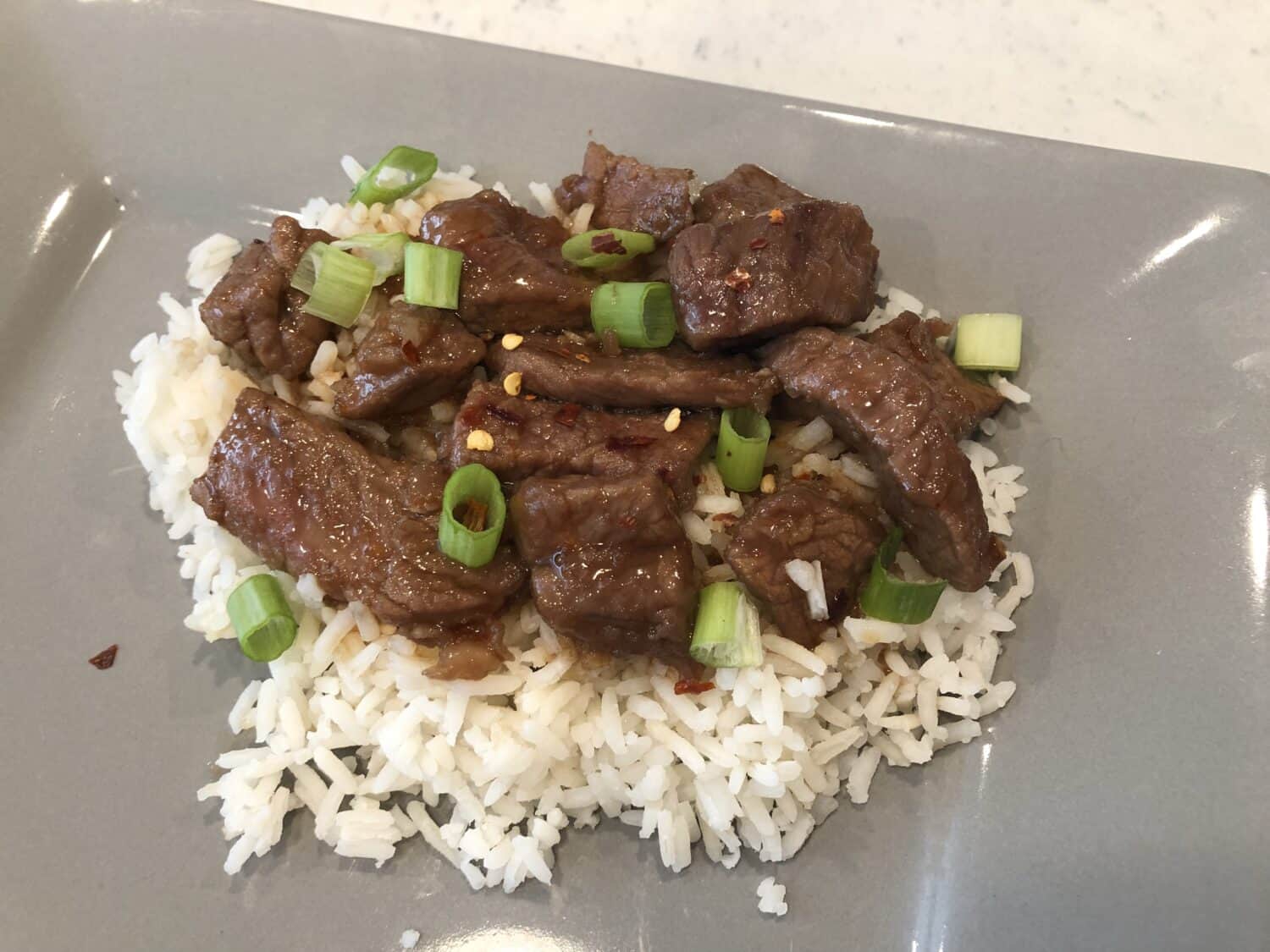 Your new favorite recipe for your weeknights is this Mongolian Beef! It tastes amazing and is really fast to put together. It seriously is so easy and the flavors do not disappoint. Please make this tonight because you are going to love it!!