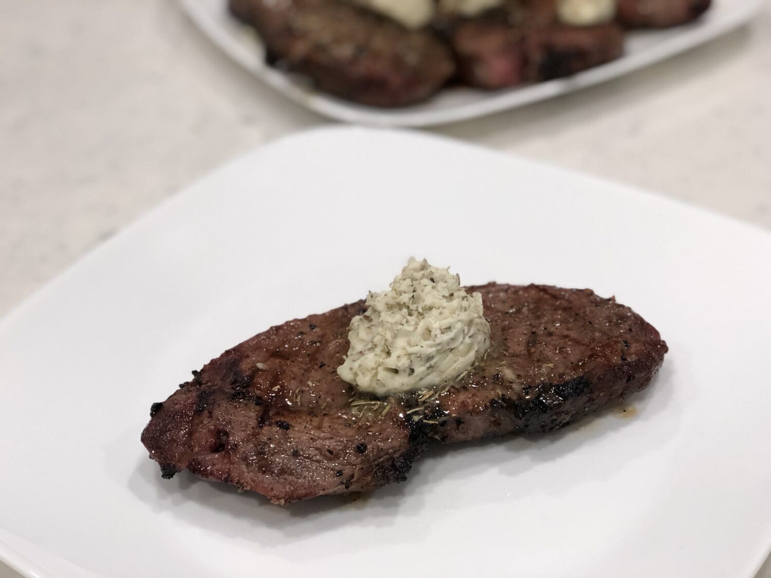 We LOVE this Herb Butter Steak. It is packed with so much amazing flavor and is a great weeknight or weekend dinner. I love that it is easy enough for a busy weeknight but it fancy enough for weekend or date night.