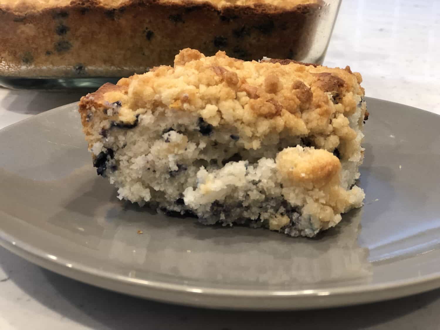 This Blueberry Crumble Cake is the easiest! I love how it is made from a muffin mix but the streusel on top takes it to another level. You could even pass it off as made from scratch..