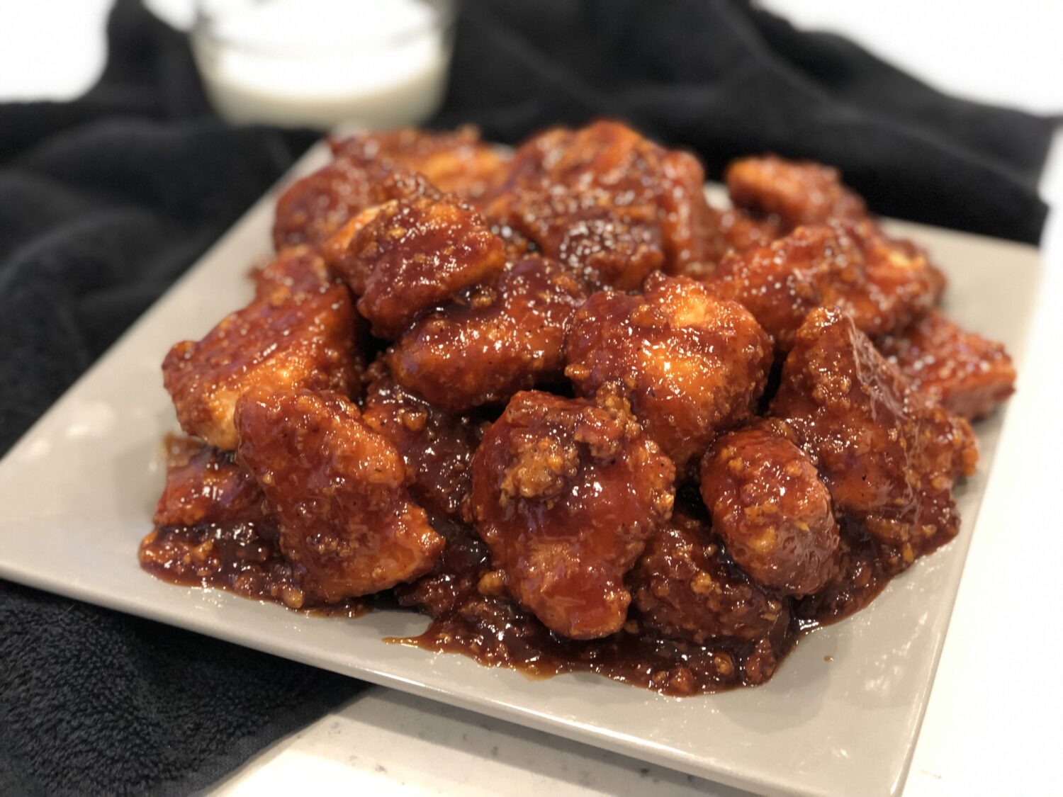 Boneless Honey BBQ Wings is our copycat Buffalo Wild Wings boneless wings recipe and it is amazing! The tender chicken and the spicy barbecue sauce are perfect. #BBQChickenRecipes #DinnerRecipes, #Wings #ChickenRecipes #Dinner #EasyDinnerRecipes #Honey #LargeBBQWings #BuffaloWildWingsBonelessWings