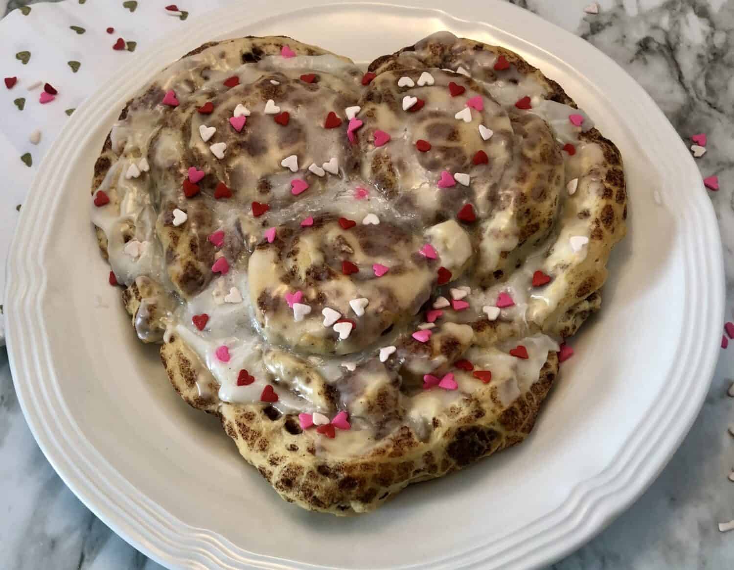 Valentine's Day Cinnamon Roll | Sweeter With Sugar | An easy and delicious breakfast idea. Cinnamon Rolls, Breakfast, Easy, Simple Recipes, Quick Breakfast Ideas, #Breakfast #ValentinesDay #CinnamonRoll #Simple #Easy #KidFriendly #KidFun #Delicious