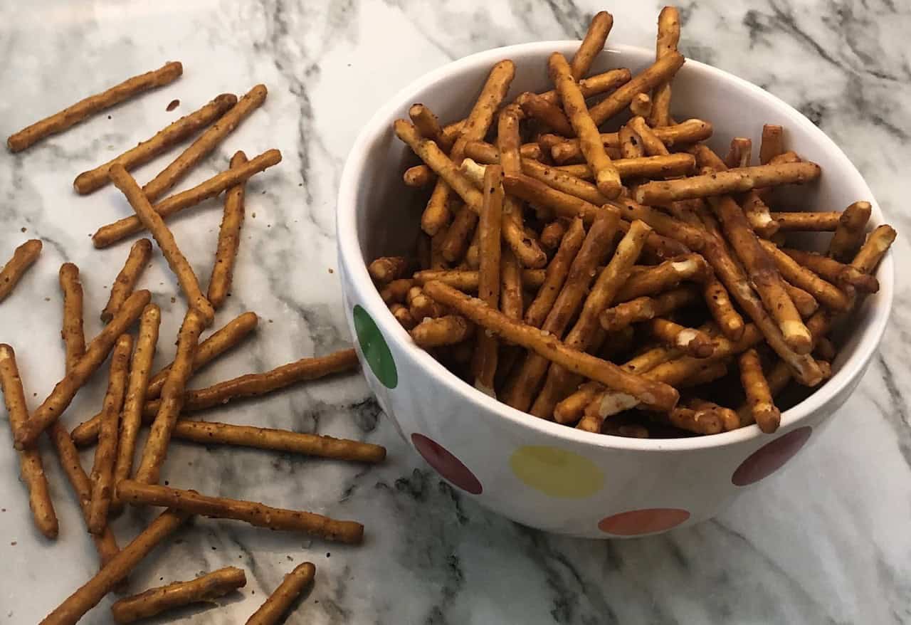Cajun Pretzel Sticks are a quick and simple snack. You will love the seasonings on these pretzel sticks.
