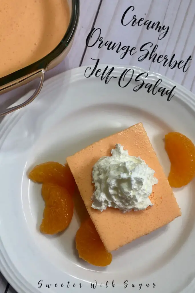 Creamy Orange Sherbet Jell-O Salad is refreshing and sweet. This side dish is easy to make. #Salads #JellORecipes #KidFriendly #SideRecipes #EasyRecipes #HolidaySides