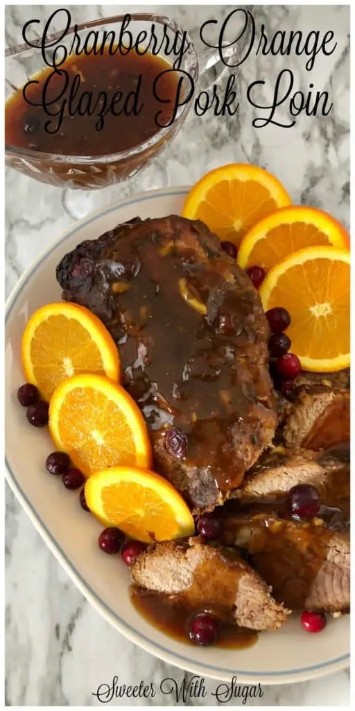 Cranberry Orange Glazed Pork Loin is a perfect slow cooker recipe you will love for the holidays. The orange and cranberry flavors go so well with the tender pork loin. #HolidayRecipes, #PorkLoin #SlowCooker #Crockpot #EasyRecipes #DinnerRecipes #Christmas #Thanksgiving