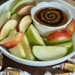 Hot Fudge Caramel Apple Dip is simple and delicious. It is perfect for snacking, parties and desserts. It is perfect for Halloween and Thanksgiving. #Fall #Holidays #Halloween #AppleDip #Caramel #HotFudge #Thanksgiving #EasyDessertIdeas #PartyIdeas