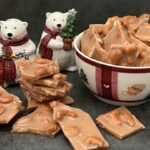 Cashew Brittle is a yummy homemade candy recipe. Cashew Brittle if full of delicious cashews surrounded by a crunchy toffee. #Christmas #Holiday #Brittle #Toffee #GiftIdeas #Desserts #Candy #HomemadeCandy #Cashew
