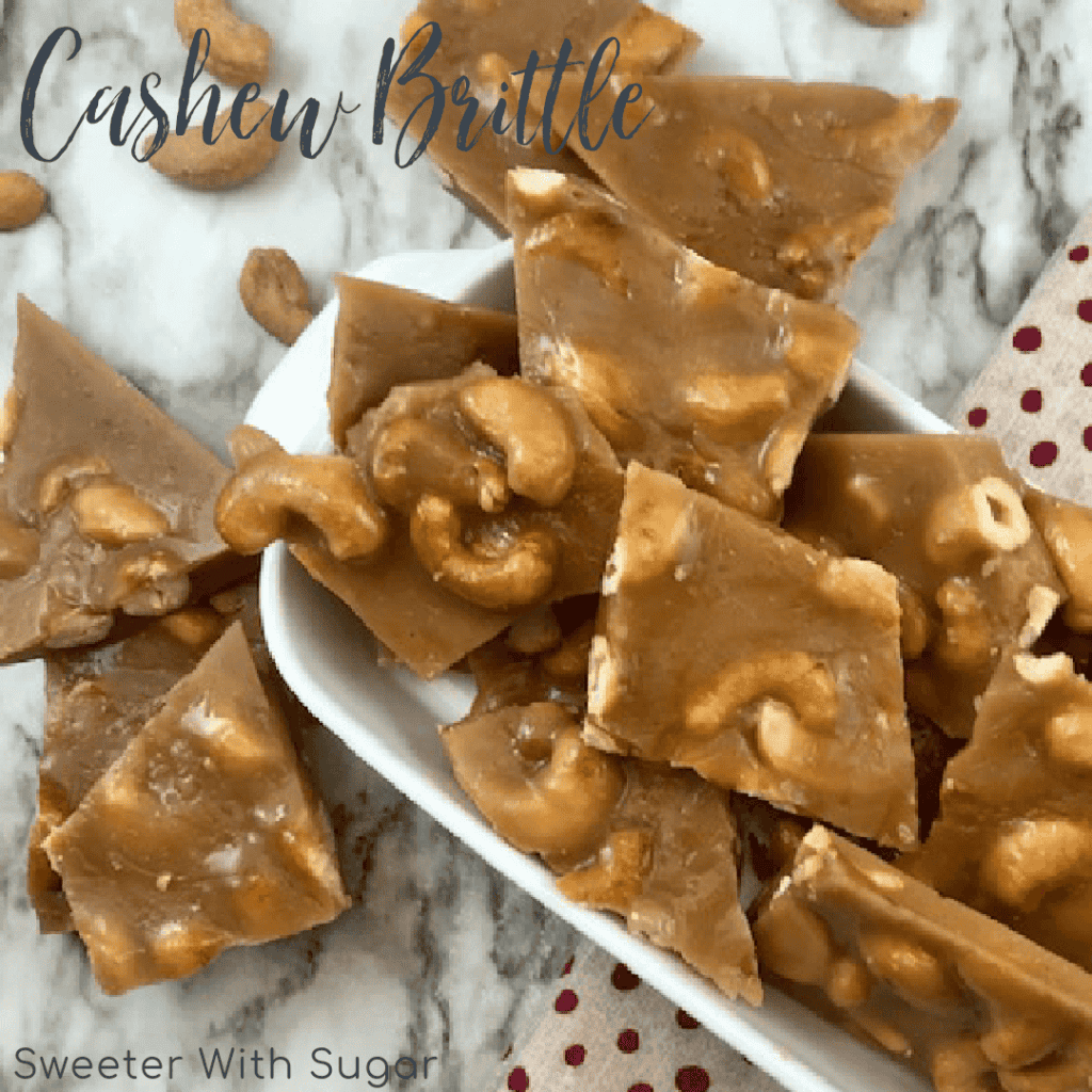 Cashew Brittle is a yummy homemade candy recipe. Cashew Brittle if full of delicious cashews surrounded by a crunchy toffee. #Christmas #Holiday #Brittle #Toffee #GiftIdeas #Desserts #Candy #HomemadeCandy #Cashew