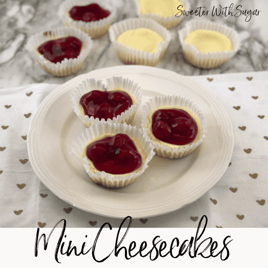 Valentine Mini Cheesecakes are fun to make-use a marble when baking to make the heart shape. This is an easy recipe and perfect for any holiday. #Christmas #ValentinesDay #MothersDay #Cheesecake #Desserts #Cherry #Raspberry