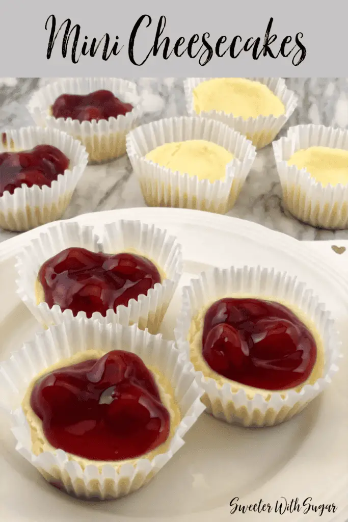 Valentine Mini Cheesecakes are fun to make-use a marble when baking to make the heart shape. This is an easy recipe and perfect for any holiday. #Christmas #ValentinesDay #MothersDay #Cheesecake #Desserts #Cherry #Raspberry