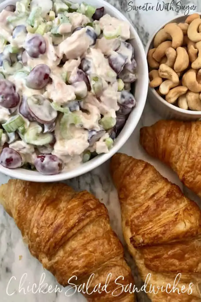 Chicken Salad Sandwiches-An easy sandwich recipe filled with the best ingredients. Chicken, Grapes, Celery, Cashews, Croissants, and Ranch Dressing, These Chicken Salad Sandwiches are perfect any night (or day) of the week. #ChickenSalad #Ranch #Brunch #MothersDay #Parties #SimpleRecipes   