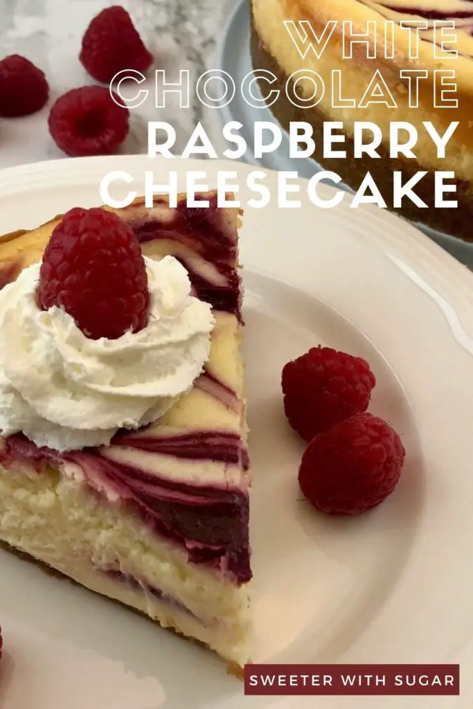 White Chocolate Raspberry Cheesecake is a decadent dessert you will love to make and eat. The creamy cheesecake and raspberry swirl is delicious and beautiful. #Cheesecake #Homemade #Raspberry #Dessert #TheBestDessertRecipe #WhiteChocolate 