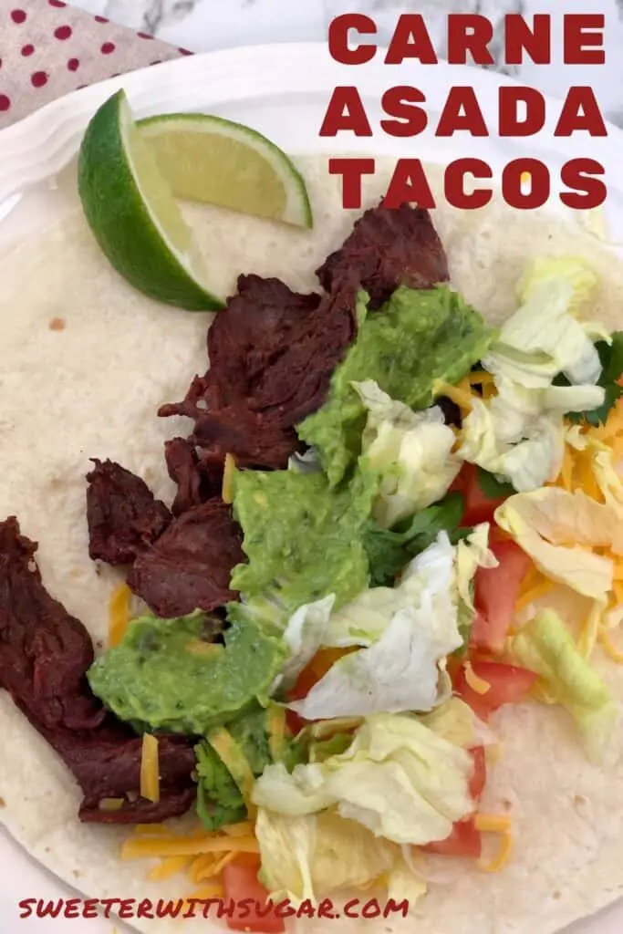 Carne Asada Tacos are the best! The beef is so flavorful-it's delicious! Top it with all kinds of taco toppings-you'll love this taco recipe for dinner anytime! #Barbecue #CarneAsada #Tacos #MexicanRecipes #Grilling