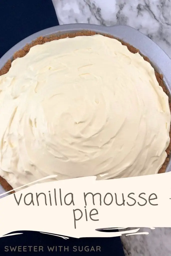 Vanilla Mousse Pie is a creamy and delicious vanilla mousse in a graham cracker crust. Vanilla Mousse Pie is an easy dessert recipe. #Vanilla #Pie #Mousse #EasyPieRecipes #VanillaMousse