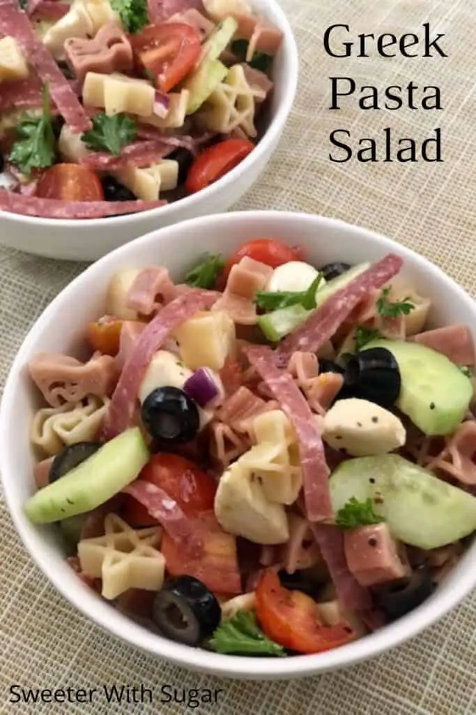 Greek Pasta Salad is filled with delicious ingredients. This cold pasta salad is perfect for barbecues or as a meal with a side of bread. Greek Pasta Salad has a flavorful salad dressing you will love. #Pasta #Salad #Greek #Barbecue #SimpleRecipes