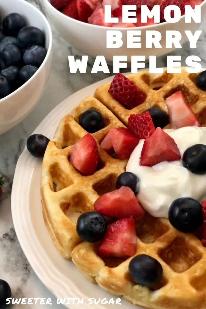 Lemon Berry Waffles make a perfect breakfast or brunch for any day of the week. These waffles are a delicious Fourth of July breakfast idea. The lemon goes so well with the fresh strawberries and blueberries. #Waffles #Breakfast #Brunch #Holiday #FourthOfJuly 