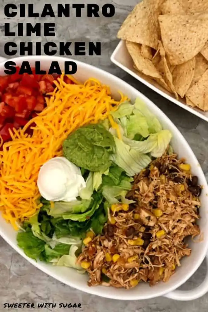 Cilantro Lime Chicken Salad is an easy family dinner recipe made with shredded chicken, corn, beans, lettuce, cheese, tomato and topped with a yummy dressing. #Crockpot #Salad #Chicken #Mexican #EasyDinnerRecipes