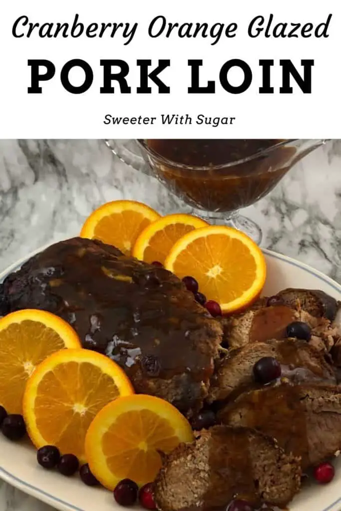 Cranberry Orange Glazed Pork Loin is a perfect slow cooker recipe you will love for the holidays. The orange and cranberry flavors go so well with the tender pork loin. #HolidayRecipes, #PorkLoin #SlowCooker #Crockpot #EasyRecipes #DinnerRecipes #Christmas #Thanksgiving