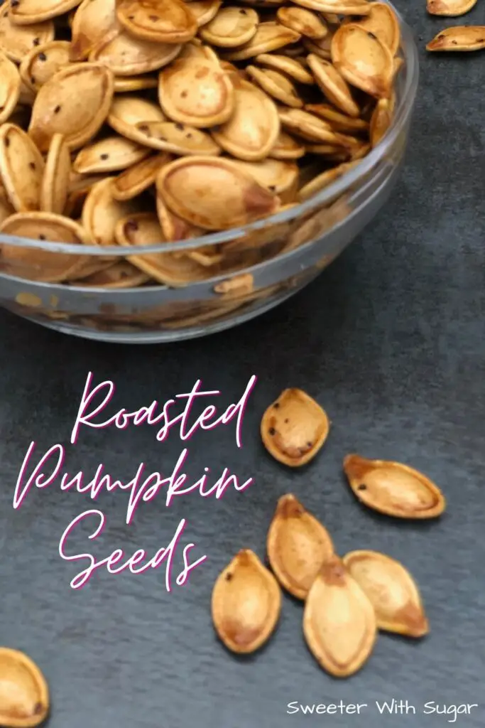 Roasted Pumpkin Seeds are a fun way to use those seeds from your Halloween Jack o' Lantern. They are easy to make and yummy to eat. #Fall #Pumpkin #PumpkinSeeds #Seeds #Halloween #RoastedSeeds #FallSnacks
