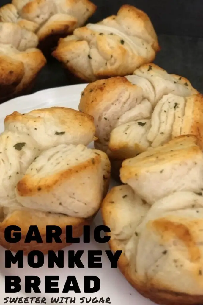 Garlic Monkey Bread is an easy bread side that will go with many main dishes. They are quick to make and only take 8 minutes to bake. #GarlicBread #MonkeyBread #BreadRecipes #EasyBreads
