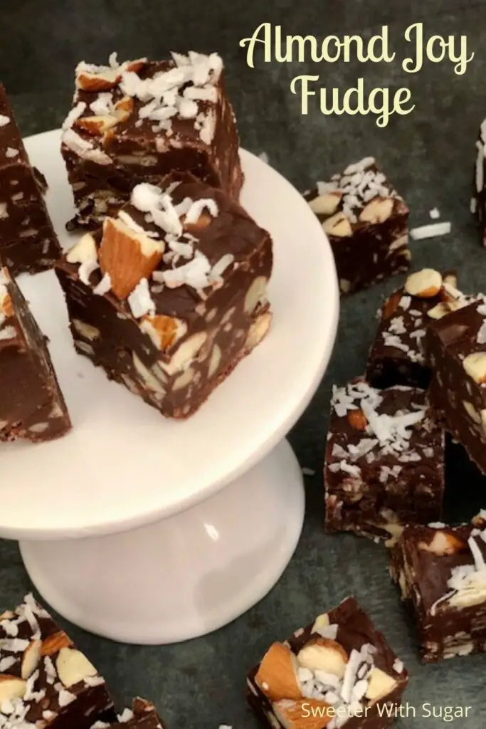 Almond Joy Fudge is an easy microwave fudge recipe you can make quickly. It requires only five ingredients and it tastes fantastic. This fudge is a great dessert or snack and is a great gift idea, too. #Holiday #CandyRecipes #Fudge #AlmondJoy #Christmas #ValentinesDay #MicrowaveRecipes 