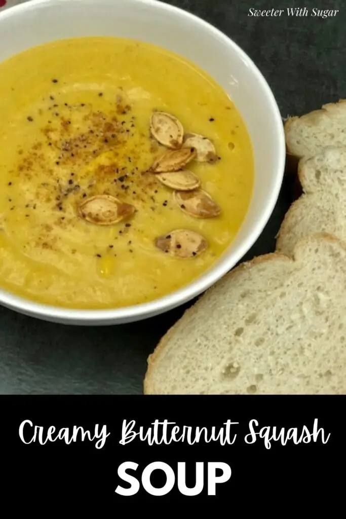 Creamy Butternut Squash Soup is an easy and yummy soup recipe with lots of vegetables. Top it with some extra cream, cajun seasoning and pumpkin seeds for some extra goodness. #Soup #ButternutSquash #SlowCooker #FallSoups