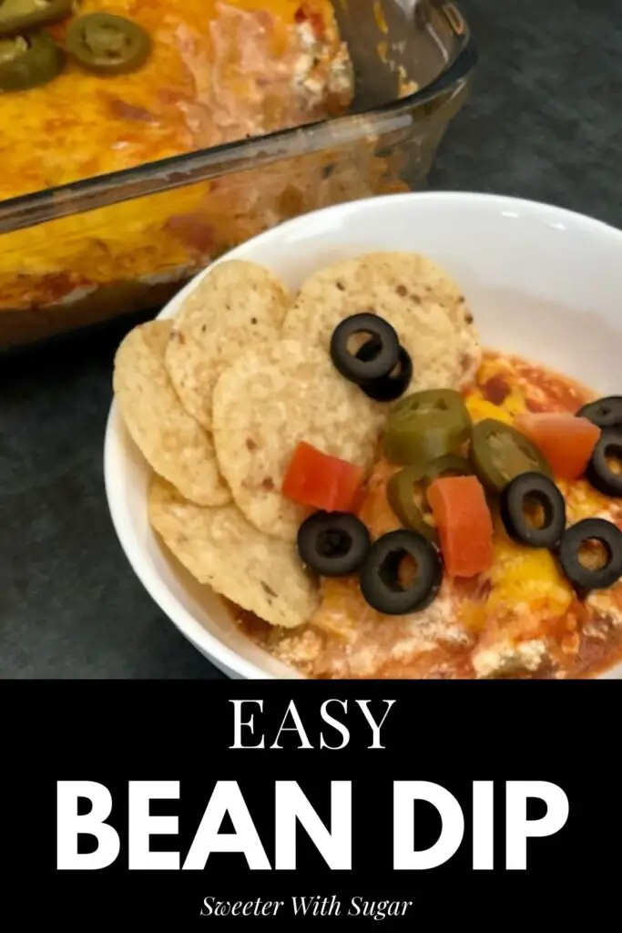 Easy Bean Dip is a quick and easy dip recipe that is perfect for parties or snacks. It is filled with yummy ingredients like, beans, green chilies,  salsa, sour cream and cheese. #BeanDip #MexicanRecipes #Snacks #Appetizers #PartyFood #NewYearsEve #DipRecipes