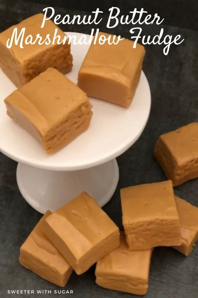 Peanut Butter Marshmallow Fudge is an easy homemade fudge recipe. Fudge is perfect for the holidays-for parties and gifts. #Fudge #Christmas #Holiday #HomemadeCandy #PeanutButter #Marshmallow