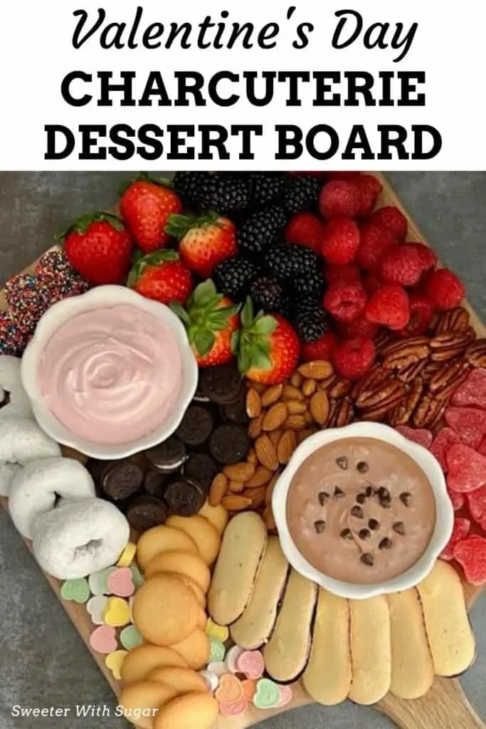 Valentine's Day Charcuterie Dessert Board is a fun and yummy dessert idea for your loved ones on Valentine's Day. This dessert board is full of fruit, nuts, cookies and other treats. #Dessert #ValentinesDay #Charcuterie #FruitDip #Treats #PartyPlatters #DessertBoard #ValentinesDessertBoard