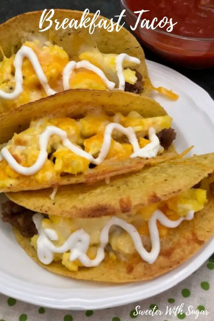 Breakfast Tacos are a fun main dish that is perfect for breakfast, brunch or dinner. These tacos are filled with sausage, egg and cheese. #Tacos #TacoTuesday #Brunch #BreakfastForDinner #Breakfast #BreakfastTacos