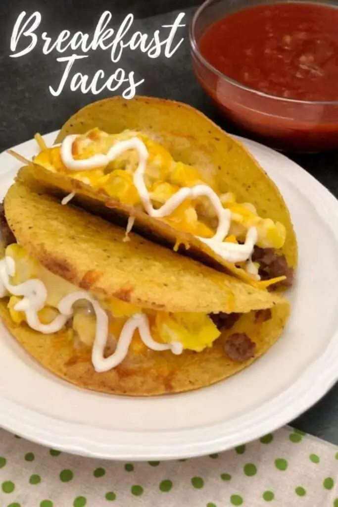 Breakfast Tacos are a fun main dish that is perfect for breakfast, brunch or dinner. These tacos are filled with sausage, egg and cheese. #Tacos #TacoTuesday #Brunch #BreakfastForDinner #Breakfast #BreakfastTacos