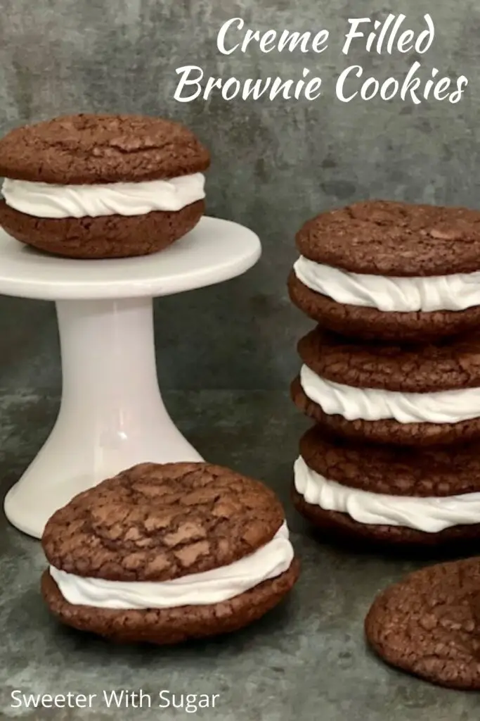Creme Filled Brownie Cookies or Homemade Oreos are super simple to make and taste fantastic. The creme filling is so creamy and sweet-yum. #Oreos #HomemadeOreos #Brownies #CremeFilling #Cookies #Desserts #EasyRecipes