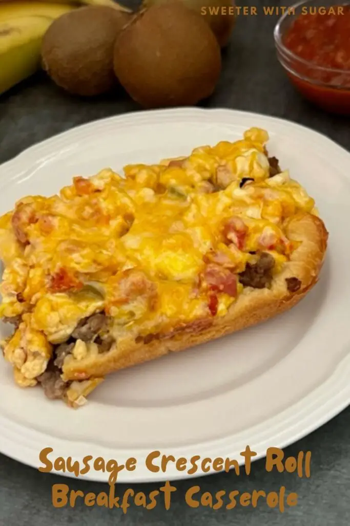 Sausage Crescent Roll Breakfast Casserole is an easy breakfast or dinner recipe filled with sausage, eggs, Rotel, cheese and crescent rolls. #CrescentRolls #Pillsbury #BreakfastCasserole #Sausage #Eggs #Rotel #Cheese