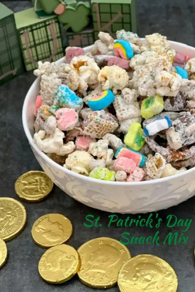 Saint Patrick's Day Snack Mix is a fun holiday recipe the kids will love. It is full of yummy flavors and colors. #StPatricksDay #SnackMix #LuckyCharms #RiceChex #CandyMelts #Popcorn #Pretzels #Rolos #HolidayRecipes