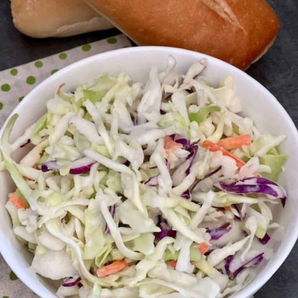 Copycat KFC Coleslaw is an easy copycat recipe that tastes great. It goes well with so many main dish recipes. #CopycatRecipes #Coleslaw #KentuckyFriedChicken #KFCCopycat #EasyRecipes #Salads