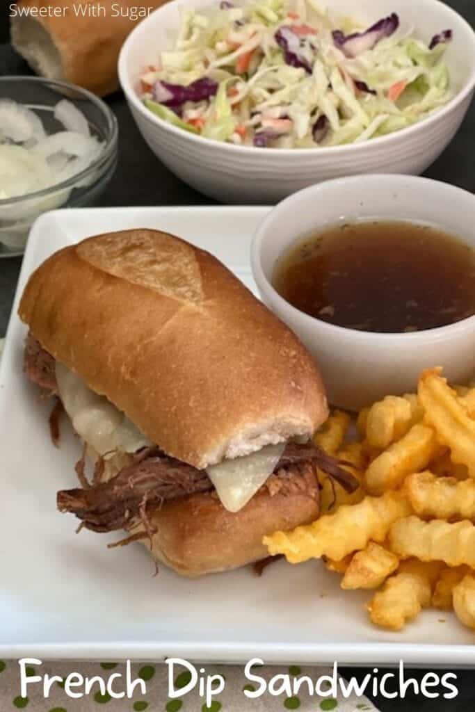 French Dip Sandwiches are a super easy dinner recipe that is perfect for weeknights. #WeeknightDinners #FrenchDip #Sandwiches #Beef #SlowCookerRecipes #DinnerIdeas #EasyDinnerRecipes #FrenchDipSandwiches