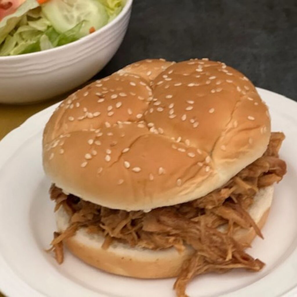 Teriyaki Orange Pulled Pork Sandwiches are super easy to make and have great flavor. This recipe can be made the day before and the leftovers freeze nicely. #PulledPork #Sandwiches #Teriyaki #OrangeMarmalade #Homemade #DinnerRecipes #EasyRecipes #Pork #PulledPorkSandwiches