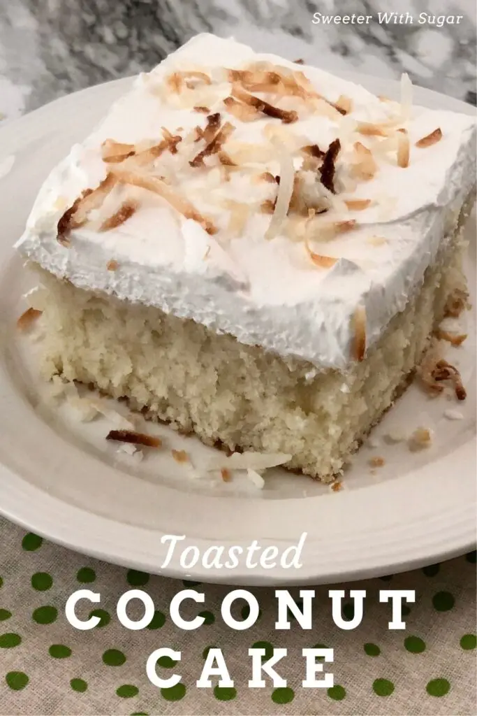 Toasted Coconut Cake is a light and delicious dessert made with a cake mix, Cool Whip and coconut. You can use toasted coconut or just coconut cream. #Desserts #Cakes #Coconut #CreamOfCoconut #WhiteCake #HolidayDesserts #EasyCakeRecipe
