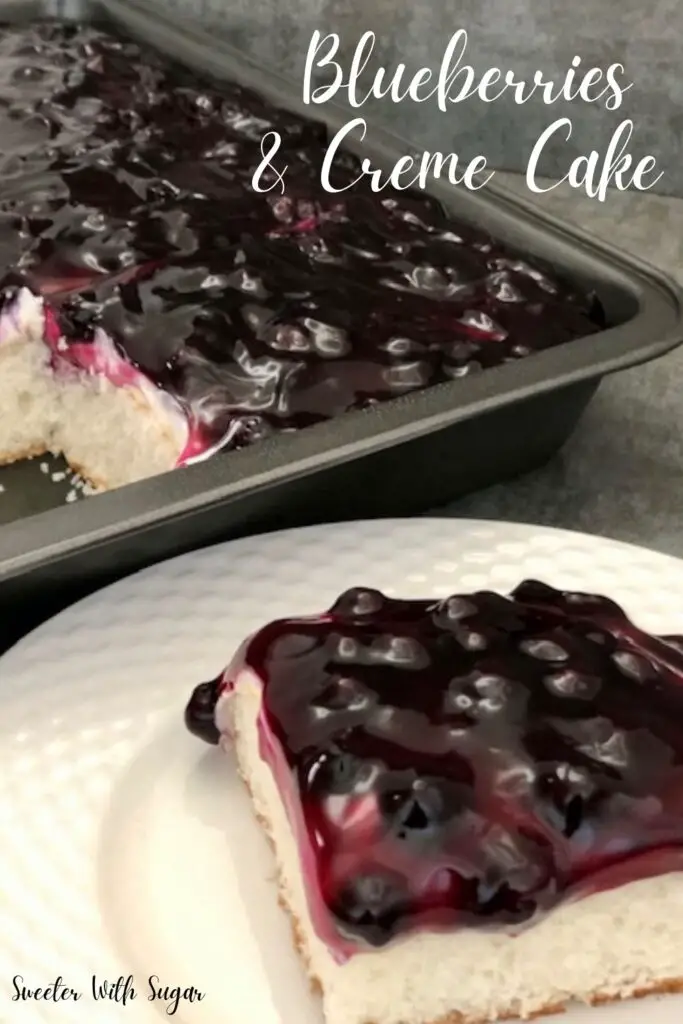 Blueberries and Creme Cake is an easy and delicious cake recipe. It is lite and fruity with a sweet cream cheese filling. #Cake #EasyDesserts #Blueberries #CreamCheeseFilling
#SummerDesserts #WhiteCakeRecipe #DuncanHines #CakeMixRecipes #PhiladelphiaCreamCheese #Pillsbury