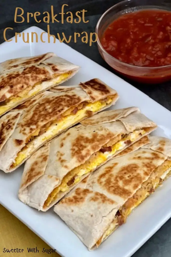 Breakfast Crunchwrap is a twist on Taco Bell's Crunchwrap Supreme. This is full of egg, bacon, two kinds of cheese and salsa. Breakfast Crunchwraps are a delicious breakfast idea. #Crunchwrap #Breakfast #EasyBreakfastRecipes #TacoBell #Rico'sNachoCheeseSauce
#BreakfastCrunchwrap 