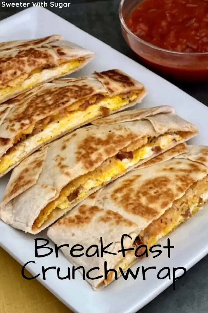 Breakfast Crunchwrap is a twist on Taco Bell's Crunchwrap Supreme. This is full of egg, bacon, two kinds of cheese and salsa. Breakfast Crunchwraps are a delicious breakfast idea. #Crunchwrap #Breakfast #EasyBreakfastRecipes #TacoBell #Rico'sNachoCheeseSauce
#BreakfastCrunchwrap 