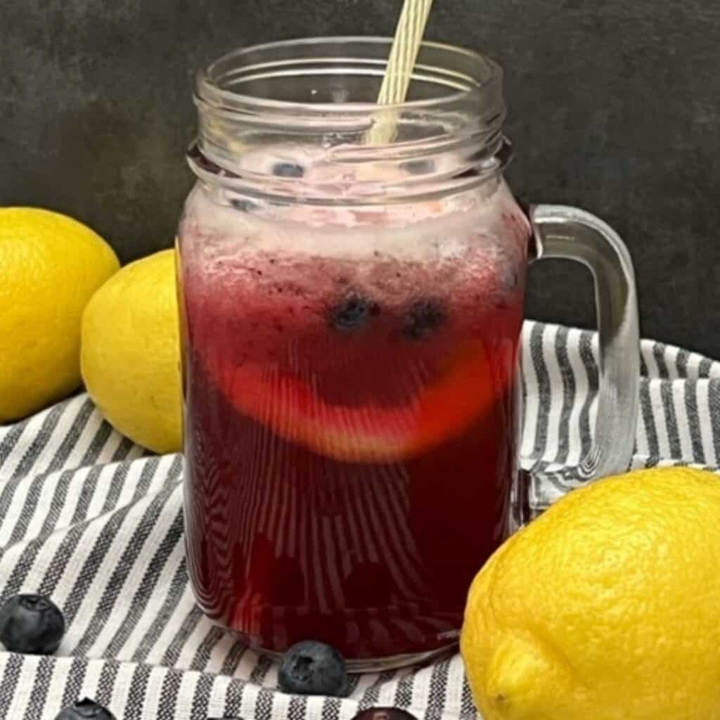 Blueberry Lemonade is a sweet and refreshing beverage. This drink recipe has the lemon and blueberry flavors everyone loves! #HomemadeLemonade #Blueberry #EasyBeverage #DrinkRecipes #BlueberryLemondade