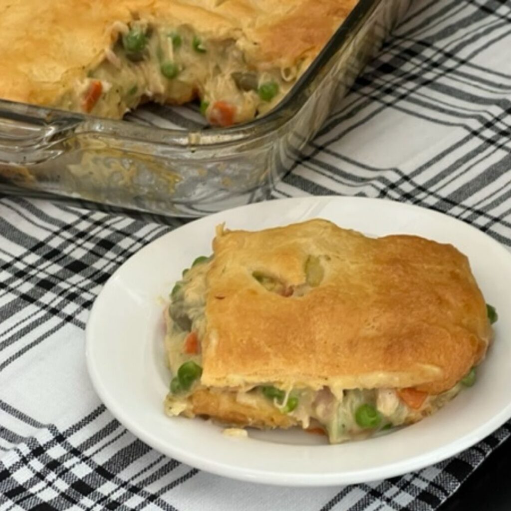 Chicken Pot Pie is a delicious comfort food recipe that is easy to make-perfect for a weeknight dinner. #Chicken #ComfortFood #ChickenPotPieRecipe #EasyDinners #Homemade #PillsburyCrescentRolls #CampbellsSoup