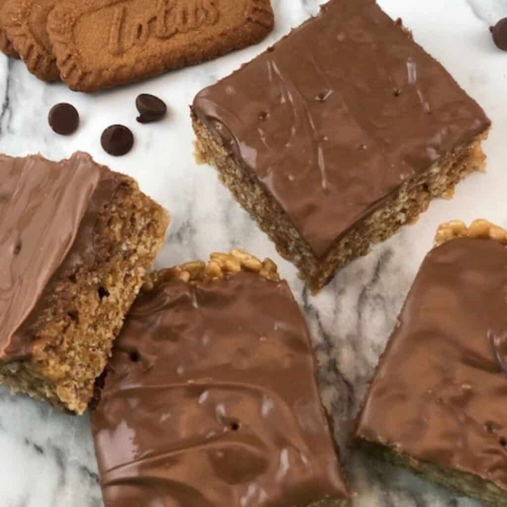 Cookie Butter-Roos are a fun twist on Scotch-a-Roos. They are a yummy dessert or snack recipe that is crispy and sweet. #Scotcharoos #CookieButter #CookieBars #LotusCookieButter #Cookies #Bars #Treats